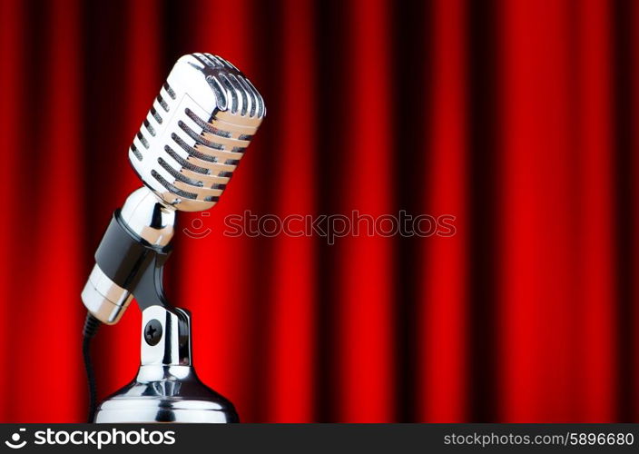 Vintage microphone against the background