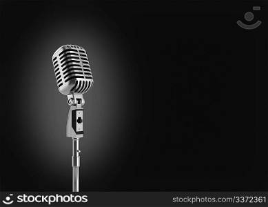 vintage microphone isolated on black background