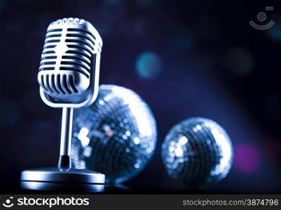 Vintage microphone, music saturated concept