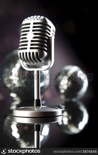 Vintage microphone, music saturated concept