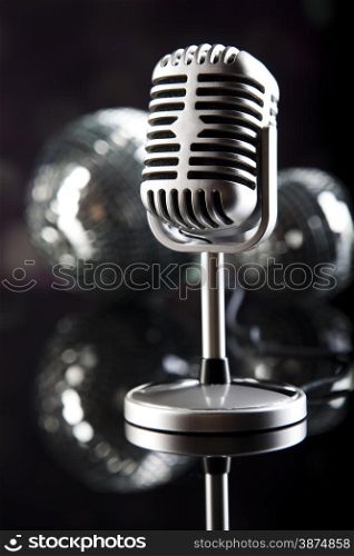 Vintage microphone, music saturated concept