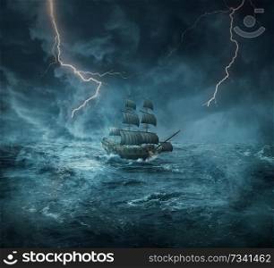 Vintage, old ship sailing lost in the ocean in a stormy night with lightnings in the sky. Adventure and journey concept
