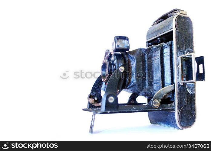 vintage old style photo camera isolated on white background