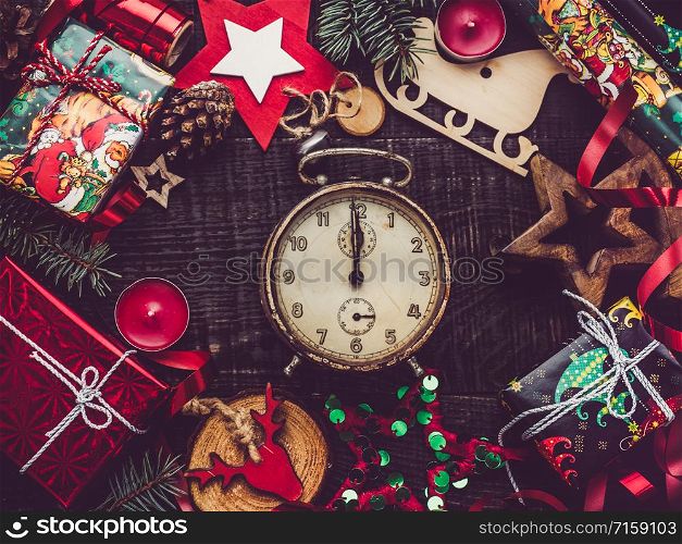 Vintage old watch and Christmas decorations. View from above, close-up, flat lay. Congratulations to loved ones, family, relatives, friends and colleagues. Merry Christmas. Happy New Year. Beautiful card