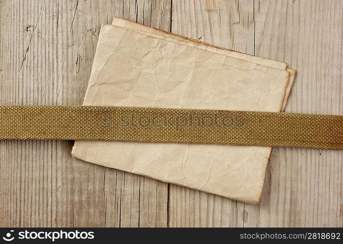 vintage paper page and notes on a wooden boards