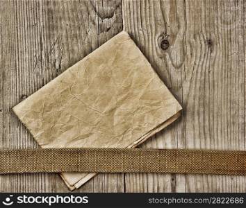 vintage paper page and notes on a wooden boards