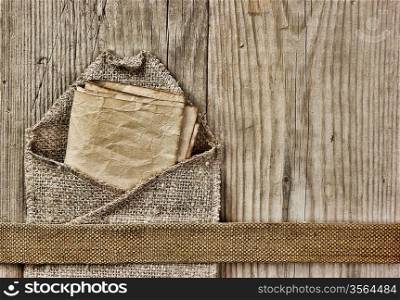 vintage paper page and notes on a wooden boards