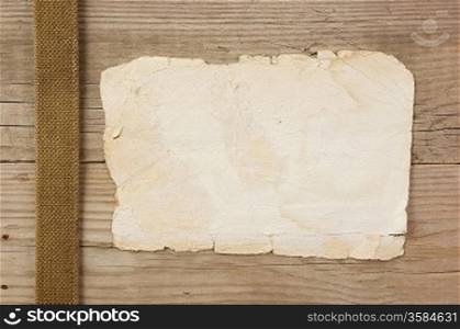 vintage paper page on old wooden boards