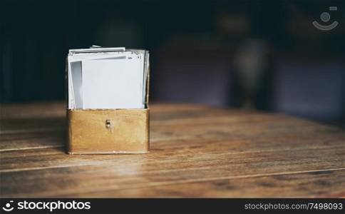 Vintage photo collection box with blur background .