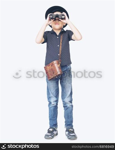 Vintage photo of 7 years old Asian traveler boy is using binoculars