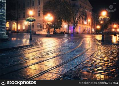 Vintage photo of old European city at night