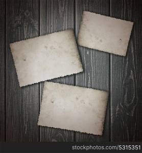 Vintage Photo Shapes over wooden desk. Abstract backgrounds