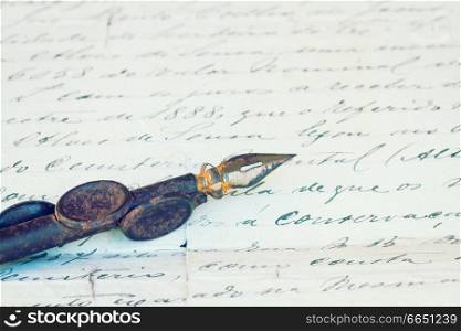 vintage  quill pen and antique letter, retro toned
