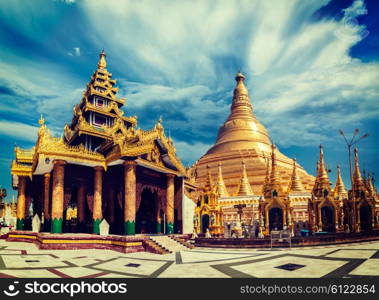 Vintage retro effect filtered hipster style image of Myanmer famous sacred place and tourist attraction landmark - Shwedagon Paya pagoda. Yangon, Myanmar