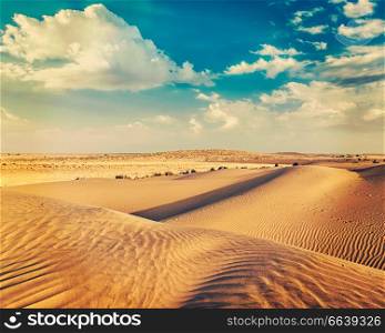 Vintage retro effect filtered hipster style image of Sam Sand dunes in Thar Desert. Rajasthan, India. Sand dunes in desert