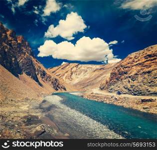Vintage retro effect filtered hipster style travel image of Himalayan landscape in Hiamalayas near Baralacha La pass. Himachal Pradesh, India