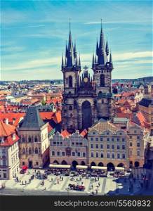 Vintage retro effect filtered hipster style travel image of Tyn Church (Tynsky Chram) on Old City Square from Town Hall. Prague, Czech Republic