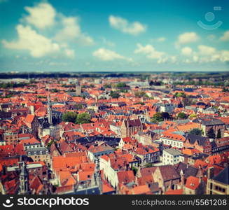 Vintage retro hipster style travel image of aerial view of Bruges (Brugge) from Belfry, Belgium with tilt shift toy effect shallow depth of field