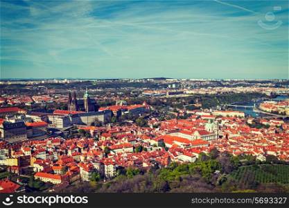 Vintage retro hipster style travel image of aerial view of Hradchany part of Prague the Saint Vitus St. Vitt&#39;s Cathedral and Prague Castle, view from Petrin Observation Tower. Prague, Czech Republic
