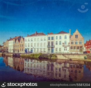 Vintage retro hipster style travel image of canal and medieval houses. Bruges (Brugge), Belgium with grunge texture overlaid