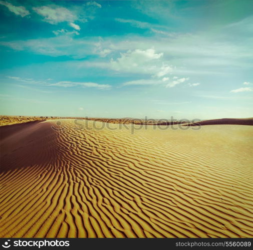 Vintage retro hipster style travel image of dunes of Thar Desert. Sam Sand dunes, Rajasthan, India