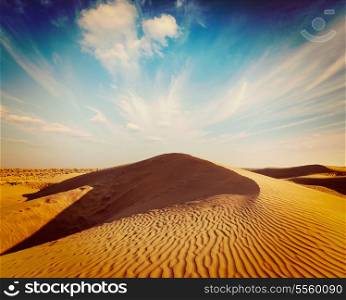 Vintage retro hipster style travel image of dunes of Thar Desert. Sam Sand dunes, Rajasthan, India
