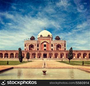 Vintage retro hipster style travel image of Humayun&rsquo;s Tomb with overlaid grunge texture. Delhi, India. UNESCO World Heritage Site. Frontal View