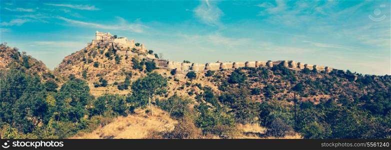 Vintage retro hipster style travel image of panorama of Kumbhalgrh fort. Rajasthan, India