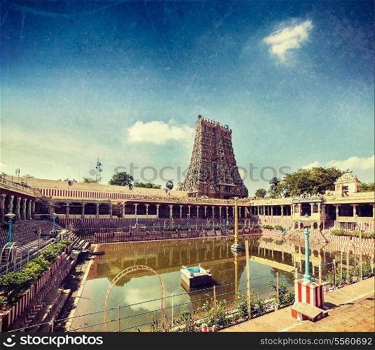 Vintage retro hipster style travel image of Sri Menakshi Temple water tank, Madurai, Tamil Nadu, India with grunge texture overlaid