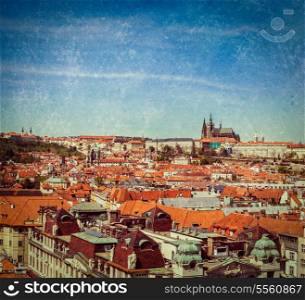 Vintage retro hipster style travel image of Stare Mesto (Old City) and and St. Vitus Cathedral from Town Hall. Prague, Czech Republic with grunge texture overlaid