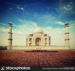 Vintage retro hipster style travel image of Taj Mahal. Indian Symbol - India travel background with grunge texture overlaid. Agra, India