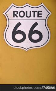 vintage route 66 sign on a yellow background