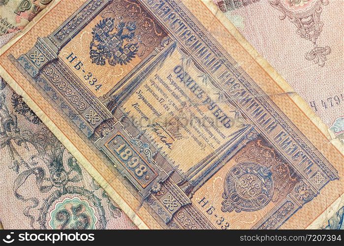 Vintage royal money. State credit card Russia, late 19th early 20th century, toned. background