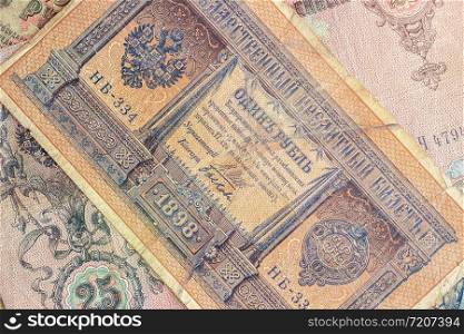 Vintage royal money. State credit card Russia, late 19th early 20th century, toned. background