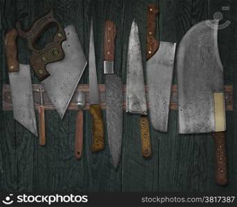 vintage set of knives on the magnet rack against wall, faded colors