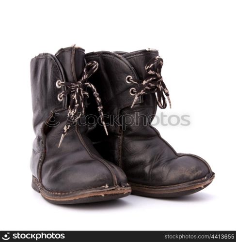 Vintage shabby child&rsquo;s boots isolated on white background cutout