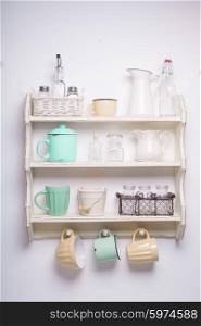 Vintage shelf in the kitchen, shabby chic style, yellow and green