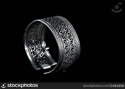Vintage silver bracelet on black background. silver bracelet on black background