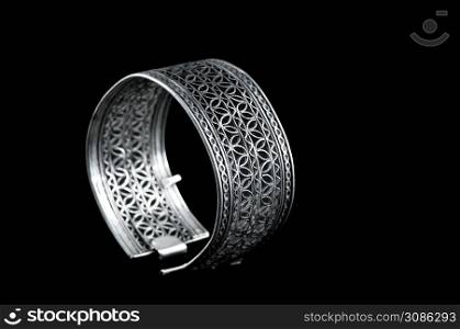 Vintage silver bracelet on black background. silver bracelet on black background
