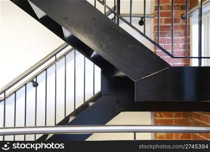 vintage staircase on a antique residential building with brick wall stones as a strong architectural detail