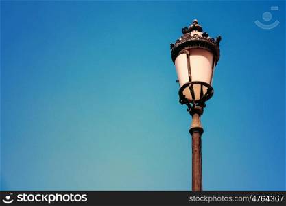 Vintage Street Lamp On Blue Sky