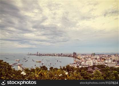 Vintage style, high view on viewpoint see cityscape at the beach and the sea of Pattaya Bay, beautiful landscape of Pattaya City landmark in Chonburi, Travel Asia to Thailand. Vintage style Pattaya City landmark in Thailand