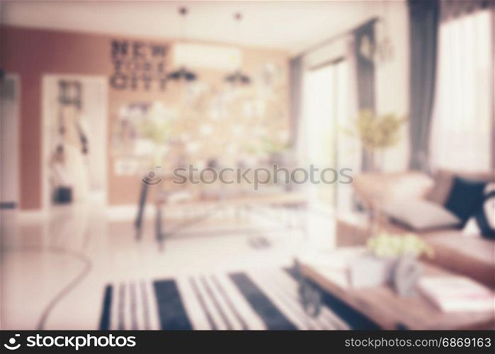 vintage style photo of modern dining corner next to the modern decorate living room blur