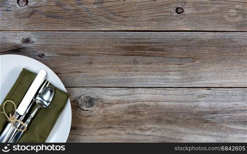 Vintage table setting on rustic wood