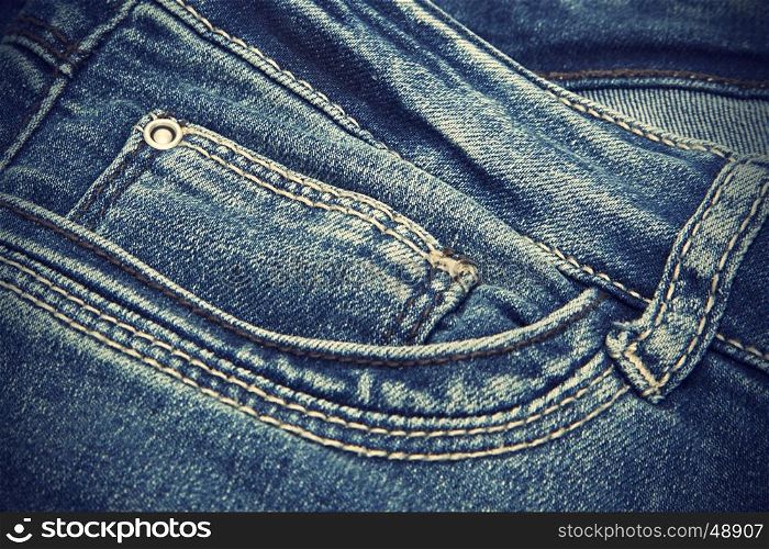 Vintage texture of closeup dark blue jeans