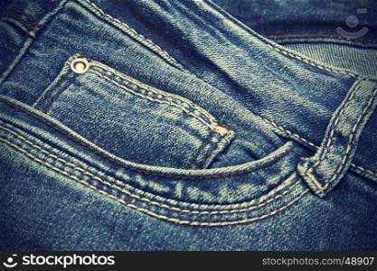 Vintage texture of closeup dark blue jeans