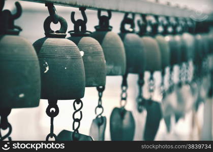 Vintage tone holy bell of ceremony in temple of Thailand