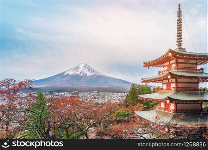 Vintage tone image of Mount Fuji and Chureito Pagoda at sunrise in autumn. Chureito pagoda is located in Fujiyoshida, Japan. Mount Fuji, Fuji san is famous natural landmark in Japan.