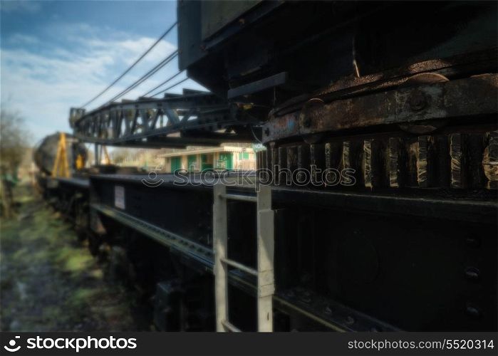 Vintage train locomotive crane equipment with shallow depth of field