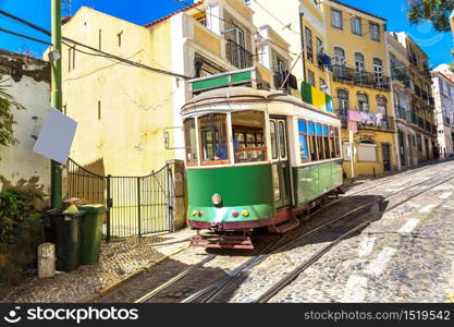 Vintage tram in the city center of Lisbon in a beautiful summer day, Portugal